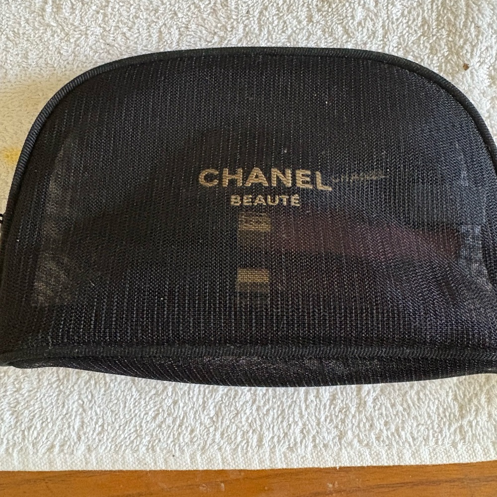 CHANEL Black Mesh Beauté Zip Makeup bag with two lip glosses and lip liner